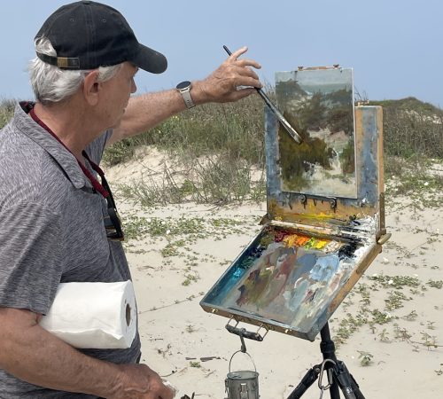 Jim Burkholder of Rockartscity Gallery attends an art workshop by Bill Davidson in Galveston Tx at the Beach